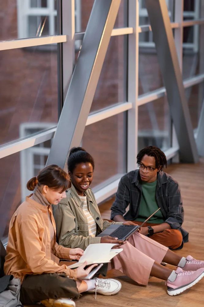 Students learning together in a coaching class